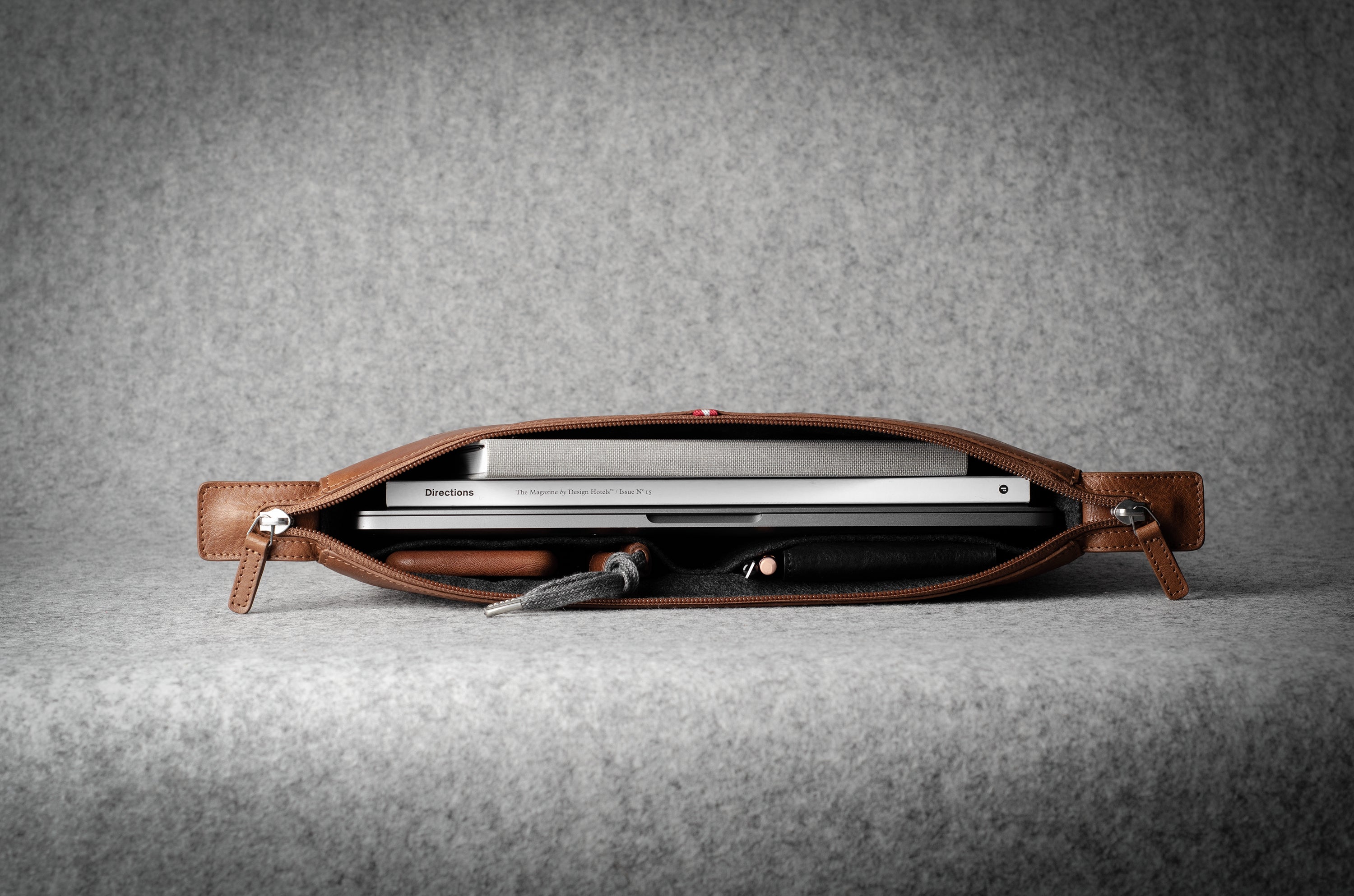 Brown leather laptop case with zip