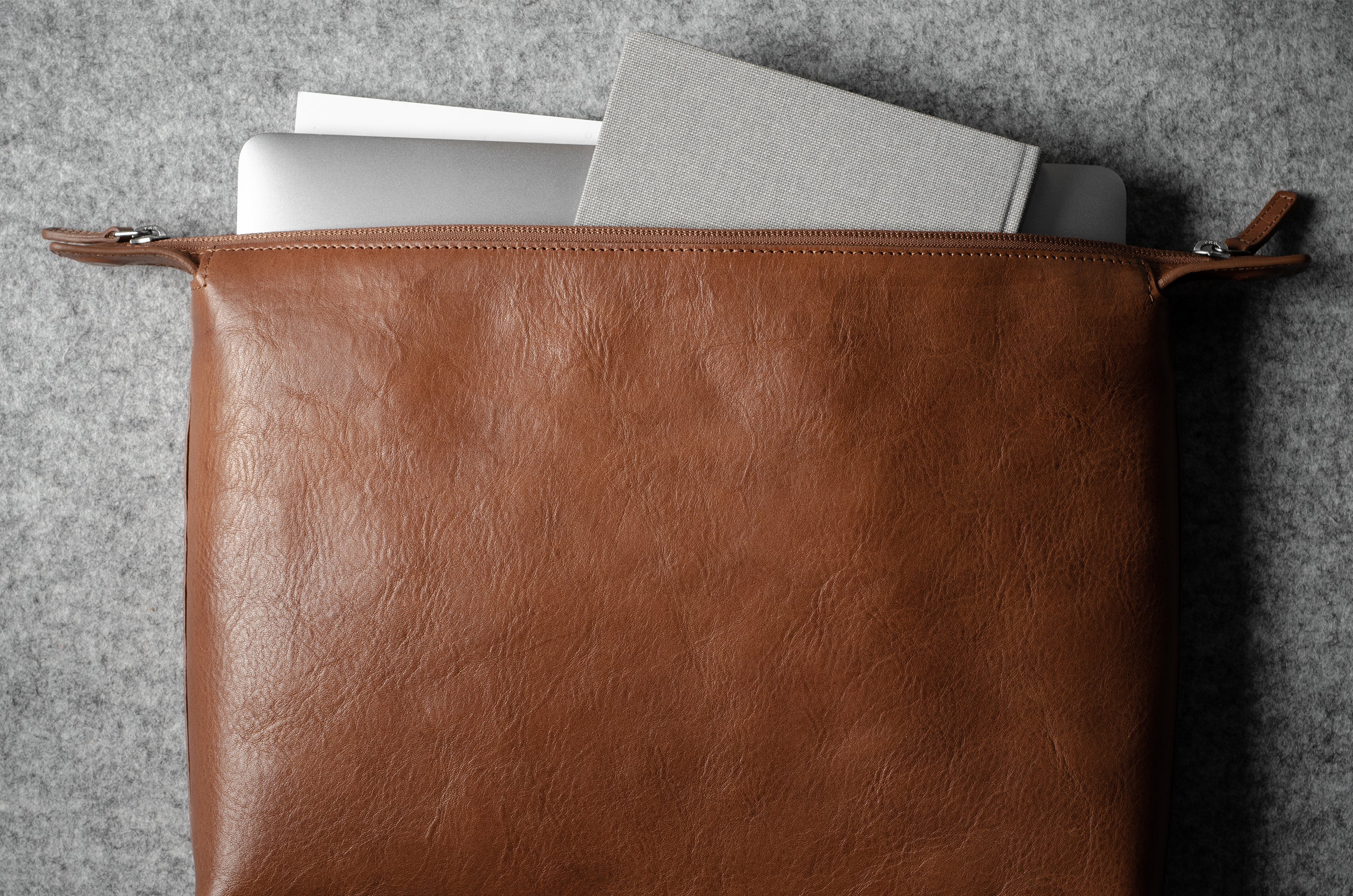 Brown leather laptop case with zip