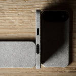 Gray iPhone case on a wooden surface
