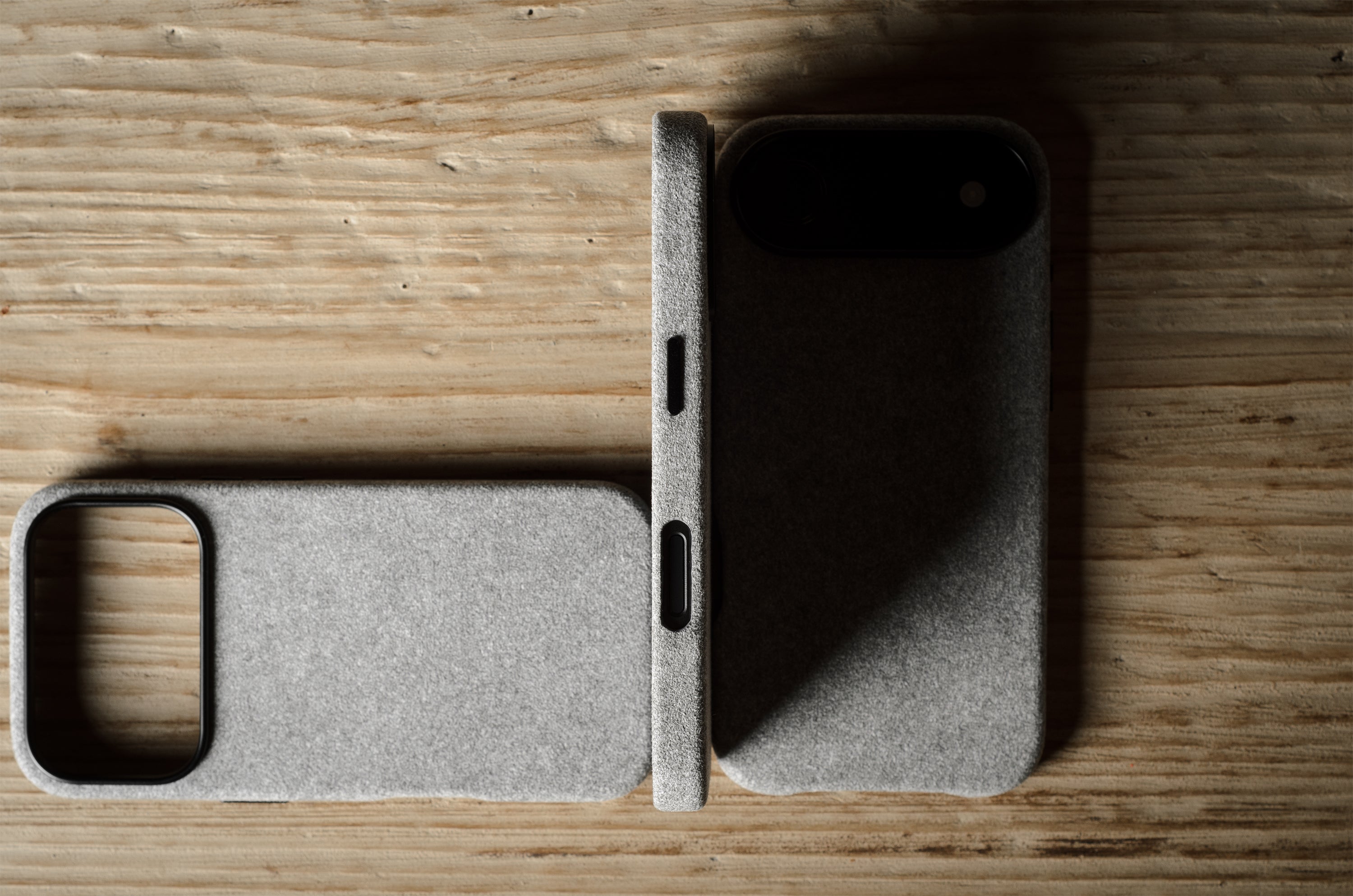 Gray iPhone case on a wooden surface