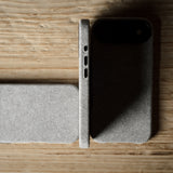Gray iPhone case on a wooden surface
