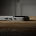 Close-up of a iPhone case on a wooden surface with a blurred background