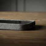 iPhone case with textured surface on a wooden surface