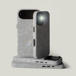 Gray iphone cases on a light grey background