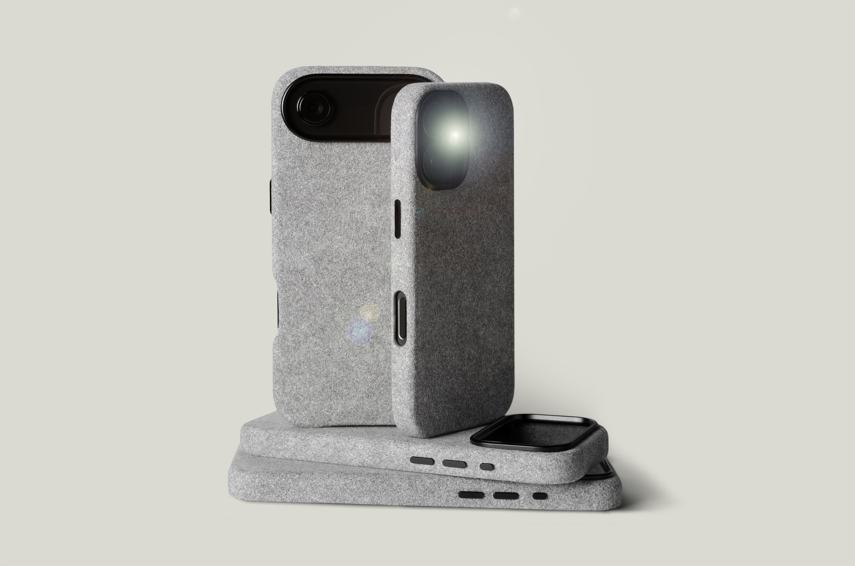 Gray iphone cases on a light grey background