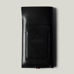 Black leather iphone case on a light gray background