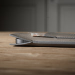 Close-up of a iphone case on a wooden surface with a blurred background