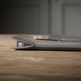 Close-up of a iphone case on a wooden surface with a blurred background