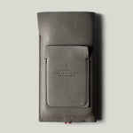 Gray leather iphone case on a light gray background